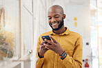 Happy black man, smartphone and typing in office for social media, networking and mobile contact. Business employee smile with cellphone, reading tech notification and information on digital news app