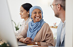 Happy, teamwork and business people in office for training, advice and collaboration while working on a computer. Smile, laugh and Muslim senior woman mentor laugh with work friend while planning  