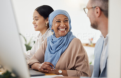 Buy stock photo Happy, teamwork and business people in office for training, advice and collaboration while working on a computer. Smile, laugh and Muslim senior woman mentor laugh with work friend while planning  