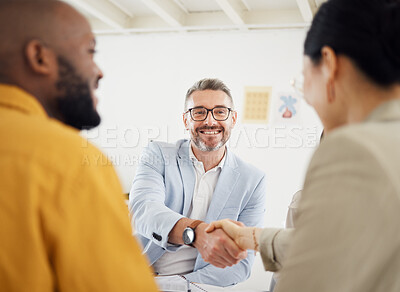 Buy stock photo Happy business people, handshake and interview in meeting, hiring or corporate growth at the office. Group of employees shaking hands in teamwork, recruiting or b2b deal for partnership at workplace