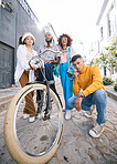 Friends group, bicycle and portrait outdoor for travel, fashion style and fun with young people in city. Diversity, gen z and men and women on date, student adventure and freedom on urban street