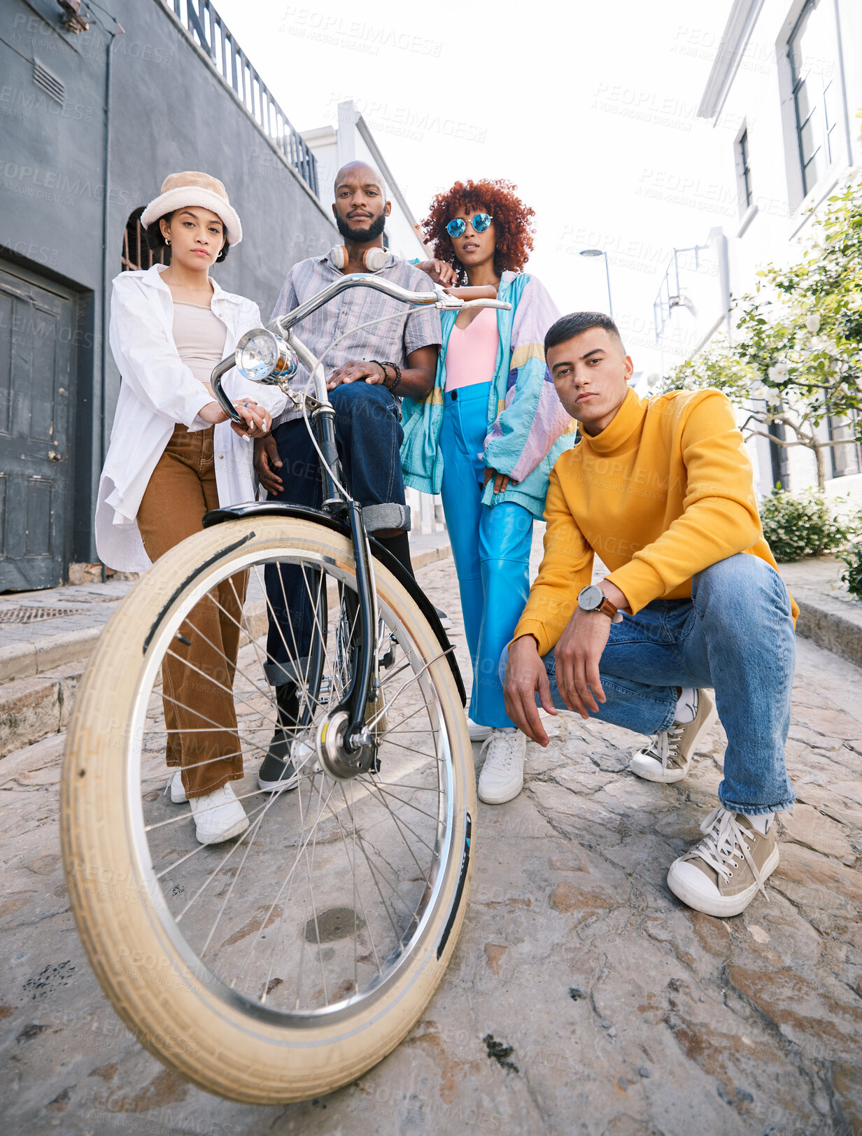 Buy stock photo Friends portrait, bicycle and group outdoor for travel, fashion style and fun with young people in city. Diversity, gen z and men and women with cool attitude and student adventure on urban street