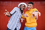 Men, gen z or portrait of friends outdoor on red background in streetwear with fashion or style together. Diversity, students or excited people with happiness, smile or freedom on holiday vacation