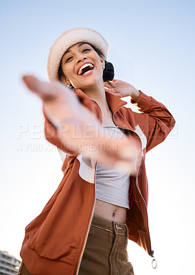 Buy stock photo Excited woman, portrait and helping hand, offer and invitation outdoor in low angle. Funny, palm and person giving assistance for support, care and laughing in acceptance of handshake sign to welcome