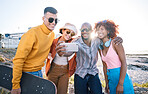Selfie, smile and group of friends by the beach on summer vacation, adventure or weekend trip. Happy, diversity and young people having fun with skateboard and taking picture by the ocean on holiday.