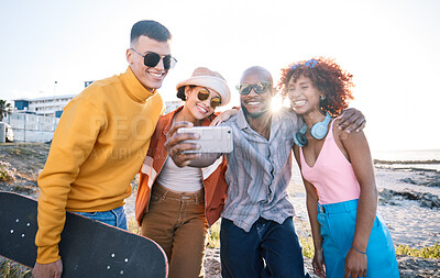 Buy stock photo Selfie, smile and group of friends by the beach on summer vacation, adventure or weekend trip. Happy, diversity and young people having fun with skateboard and taking picture by the ocean on holiday.