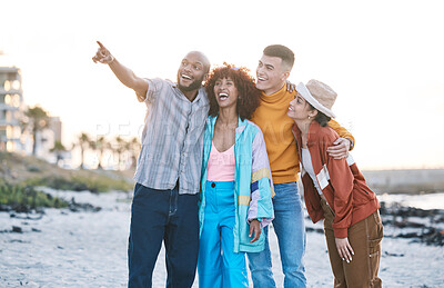 Buy stock photo Beach, friends and people with view, gen z and fashion with smile, pointing and travel with hug outdoor. Happy in nature, ocean and urban streetwear style, adventure and friendship with students