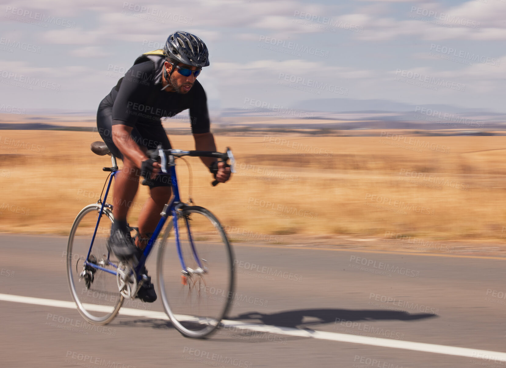 Buy stock photo Speed, nature and man cycling on road for workout, exercise and scenic mountain path. Fitness, wellness and cyclist on fast bike on summer morning for training, practice and bicycle race with motion.