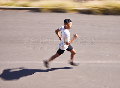 Buy stock photo Health, running and motion blur with a sports man on a road for his cardio or endurance workout from above. Exercise, fitness and a runner training for a marathon in the mountains during summer
