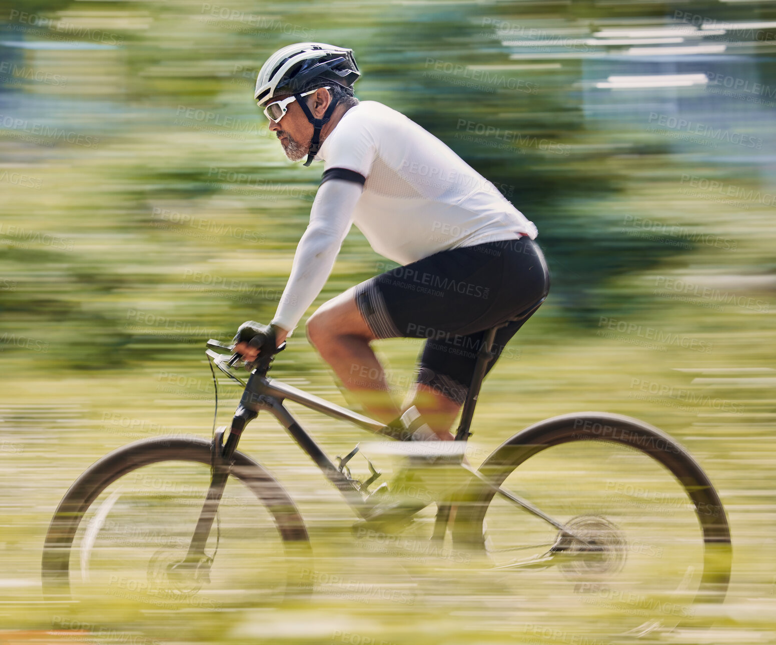 Buy stock photo Fitness, freedom and man cycling in forest for speed, training or nature, workout and off road race. Energy, workout and cyclist on mountain bike for extreme sports, adrenaline or power performance