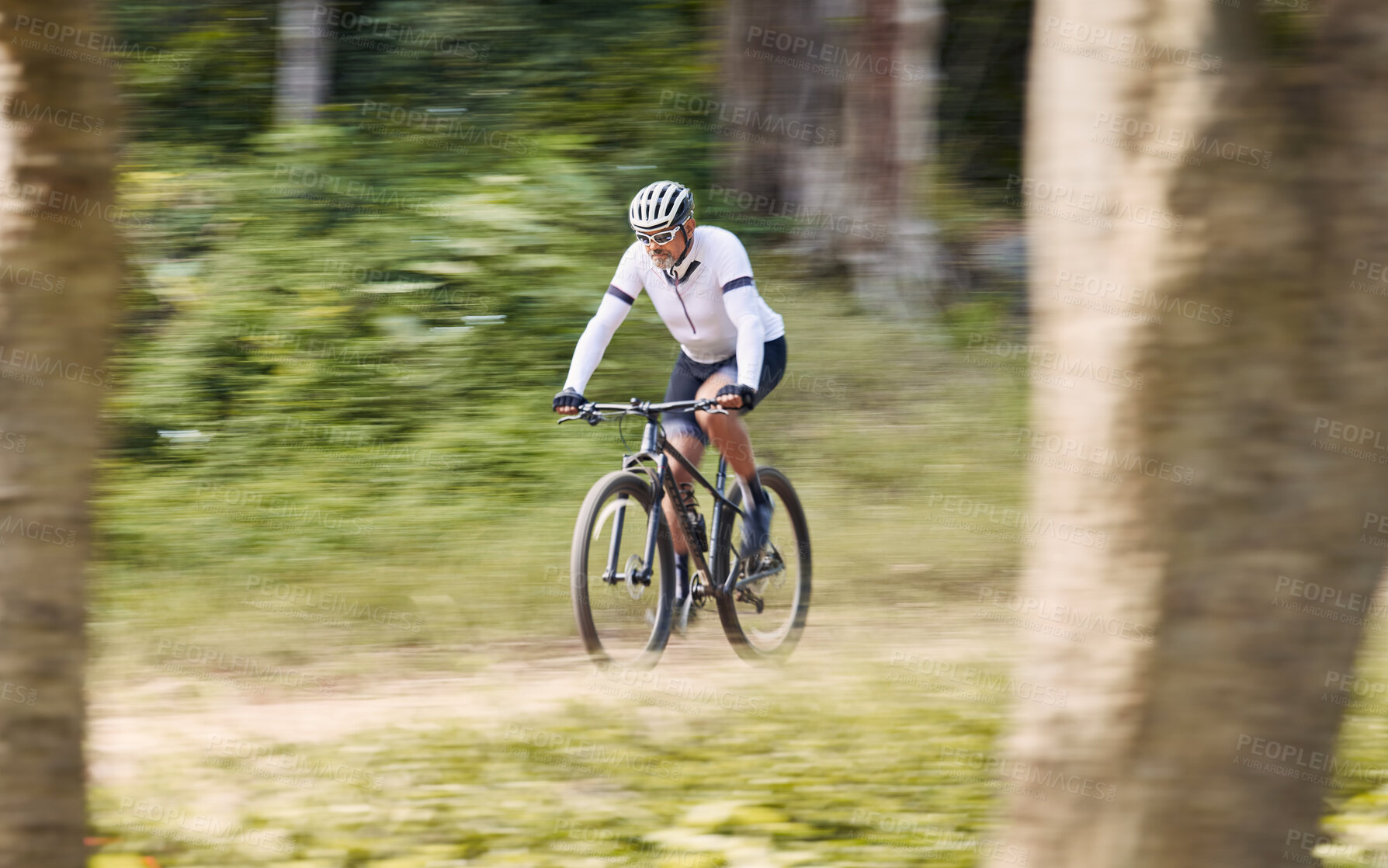 Buy stock photo Forest blur, mountain bike and sports man cycling, action and ride bicycle for cardio, fitness or transportation. Sustainable, green nature trees and cyclist training, speed and travel in woods path