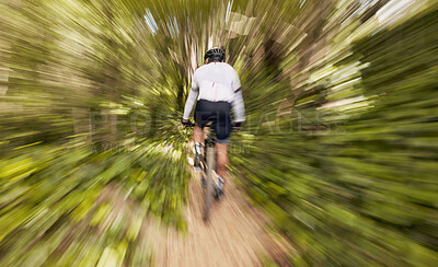 Buy stock photo Blur motion, cycling and man in nature training for a race, marathon or competition in a forest. Fast, fitness and back of male cyclist athlete riding bicycle at speed for cardio exercise or workout.