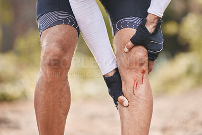 Buy stock photo Fitness, knee pain and man with blood, injury or sports mistake in park for cycling, training or exercise accident. Bleeding, wound and cyclist with biking fail, joint or leg emergency or broken bone