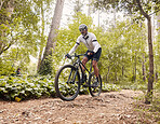 Nature cycling, sports bike and man travel, ride or journey on triathlon race, outdoor challenge or bicycle exercise. Freedom adventure, path or active cyclist training, fitness and workout in forest