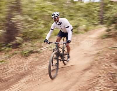 Buy stock photo Cycling, fitness and man with bicycle in a forest for speed, training or workout in nature for off road hobby. Extreme sports, mountain bike and cyclist in woods for workout or adrenaline performance