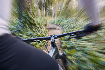 Buy stock photo Nature, mountain bike sports and hands of person travel, ride and fast journey on off road path, cycling challenge or exercise. Bicycle handle bar, motion blur and athlete speed, training and action
