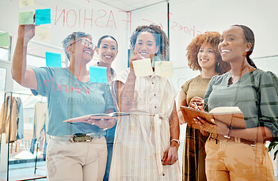 Buy stock photo Happy creative women, writing and meeting in planning, brainstorming or team strategy on glass board at office. Group of employees in startup project plan, agenda or schedule tasks at the workplace