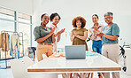 Success, happy people or applause in meeting for fashion design bonus, growth or achievement. Laptop, proud or designers clapping hands in celebration of teamwork, goal target or promotion in startup