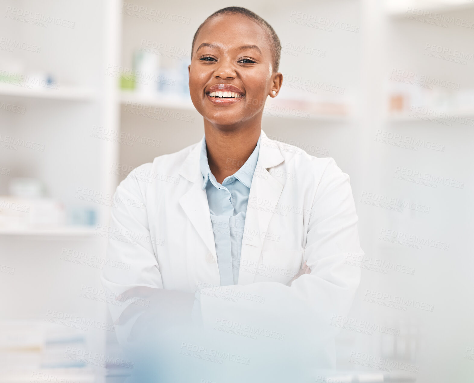 Buy stock photo Crossed arms, smile and portrait of black woman pharmacist working in chemist for medication dispensary. Happy, confident and African pharmaceutical worker in medicine pharmacy for healthcare career.