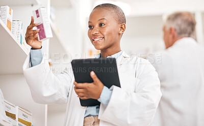 Buy stock photo Happy, pharmacy and black woman with a tablet, medical or search internet for medication or pill box for treatment. Healthcare, pharmaceutical and African person with technology or check information