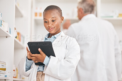 Buy stock photo Inventory, pharmacist and black woman with a tablet, healthcare and research with connection in a drugstore. Medical, pharmaceutical and African person with technology, network or check prescription