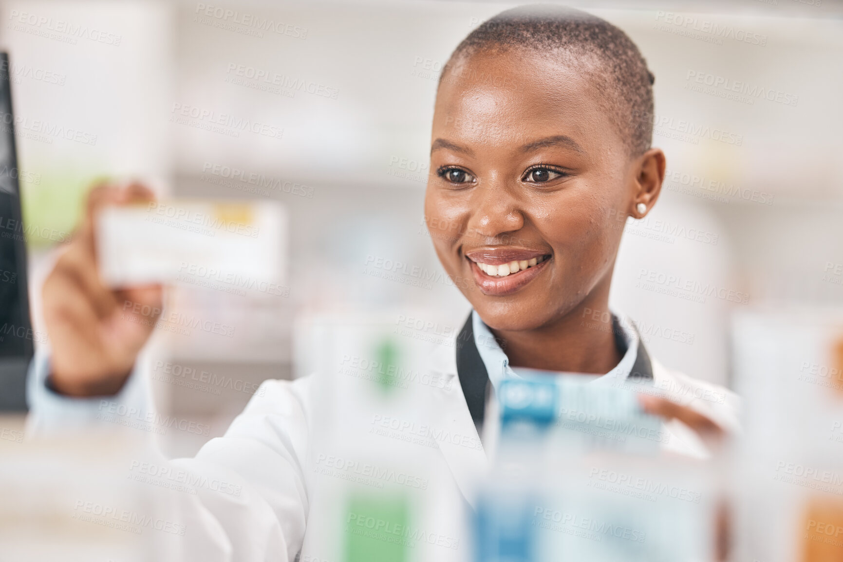 Buy stock photo Pharmacist black woman, check box and shelf with thinking, smile and product in hands, wellness or drugs. African pharmaceutical expert, package and pills in stock, inventory and retail health shop