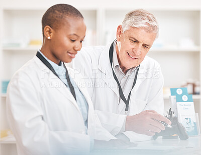Buy stock photo Man, woman and paperwork in pharmacy for checklist, schedule or stock report for medicine. Help, mentor and pharmacist team at counter with inventory list, medical insurance documents or information.