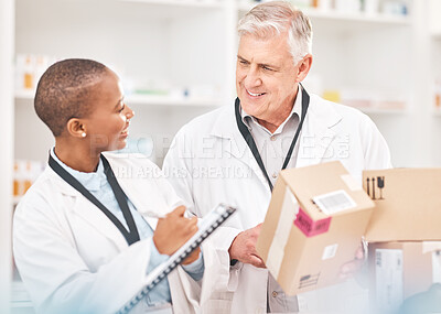 Buy stock photo Man, woman and package in pharmacy for checklist, delivery schedule or stock report for medicine. Help, mentor and pharmacist team with inventory list, boxes of pharmaceutical product or medical info