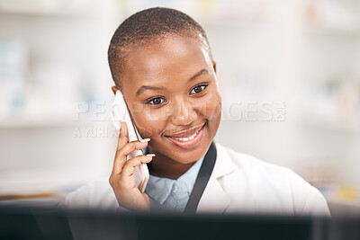 Buy stock photo Pharmacy, smile and woman talking on a phone call while reading information. African person or pharmacist on smartphone for telehealth, consultation or customer service and health care advice