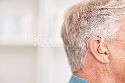Buy stock photo Hearing aid, closeup and ear of man with disability for medical support, help listening or healthcare at mockup space. Face of deaf patient with audiology implant for sound waves, amplifier or volume