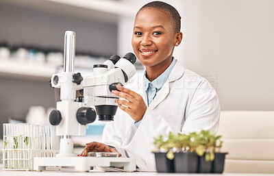 Buy stock photo Science portrait, woman and plants, microscope or laboratory research for agriculture, sustainability and leaves test. Scientist, African student or happy doctor, lens and eco study or food security