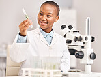 Scientist, woman and plants, test tube and pharmaceutical research, sustainable or herbs medicine in laboratory. Medical student or happy african person in science analysis with eco friendly solution