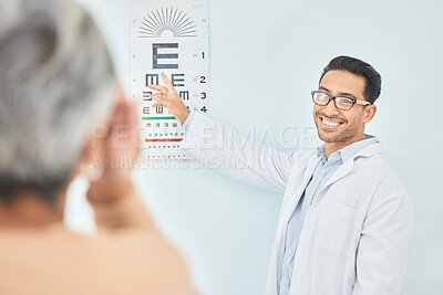 Buy stock photo Vision, test for eyes and reading chart, optometrist and patient, healthcare and alphabet at clinic. Eye care, glasses and diagnosis with assessment, health and wellness, people with trust and help