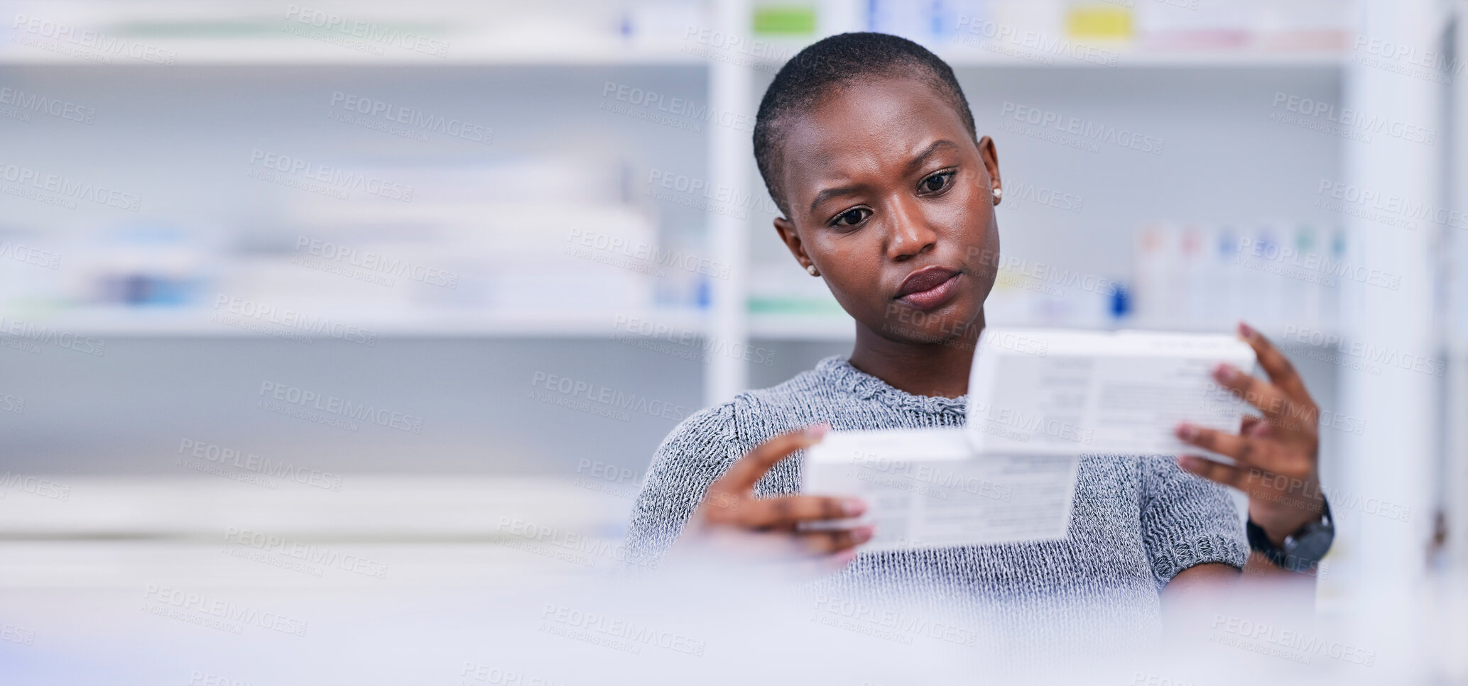 Buy stock photo Pharmacy, product choice and black woman, customer or client reading pills box label, instruction or medication. Mockup space, supplements comparison and African person with medicine brand decision