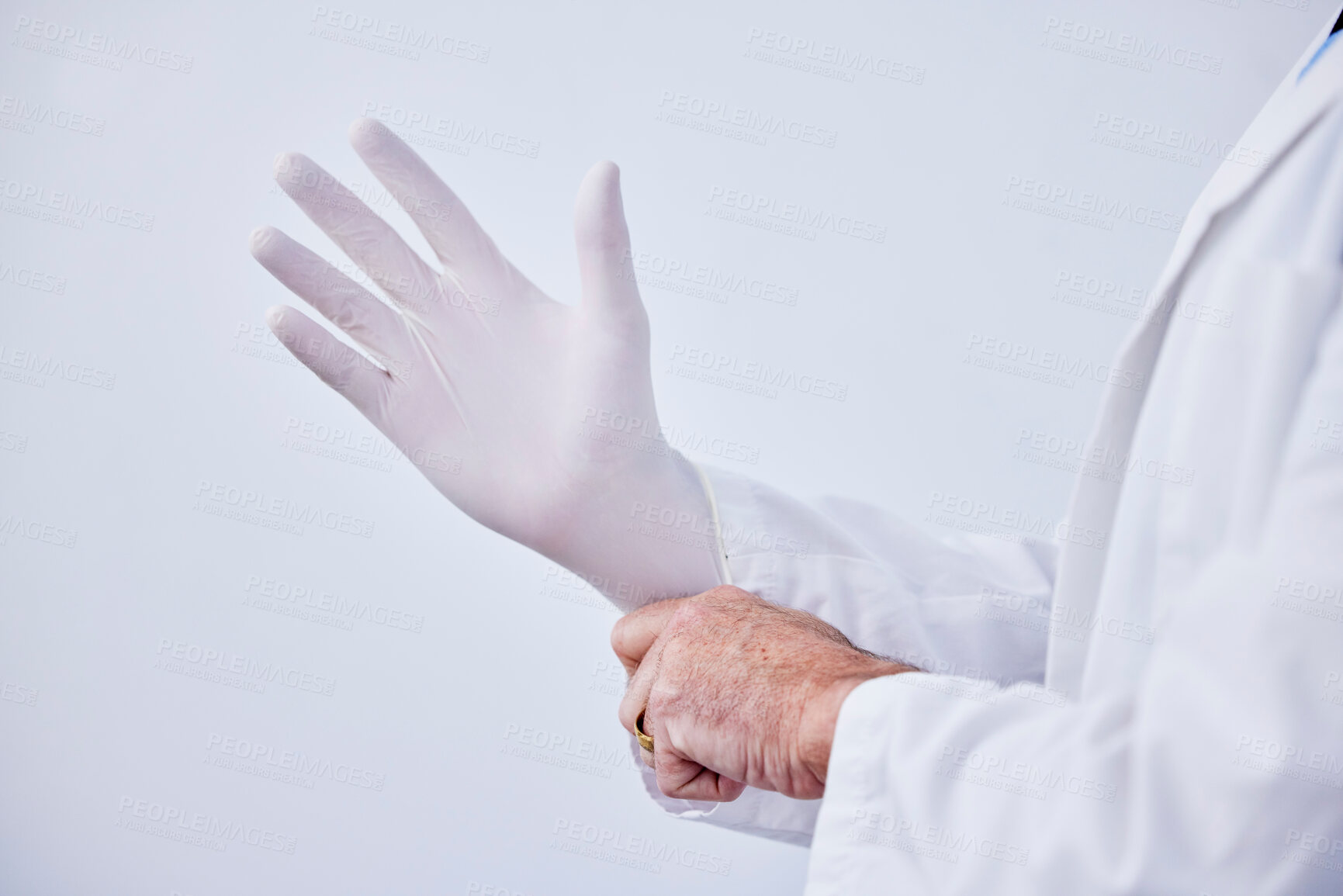 Buy stock photo Doctor, hand and glove for medical or health care with hygiene, medicine and wellness in studio. Closeup of a professional person with ppe for safety, protection and insurance on a white background