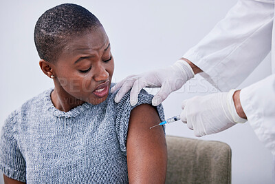 Buy stock photo Flu shot, black woman or patient with vaccine, needle or healthcare with treatment, cure or hands. Arm, person or lady with doctor, injection or medication with vaccination, consultation or syringe