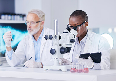 Buy stock photo Science, laboratory and black woman with microscope, tablet and man with blood sample, test tube and medicine. Professional scientist team with study on virus growth, dna and analysis in lab together