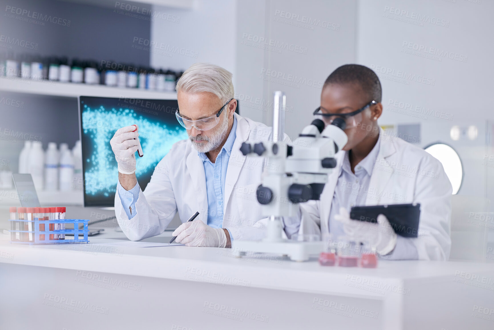 Buy stock photo Black woman, man and microscope in lab with blood sample, tablet and test tube for medical study. Scientist team in laboratory for digital report, research and innovation in dna technology in science