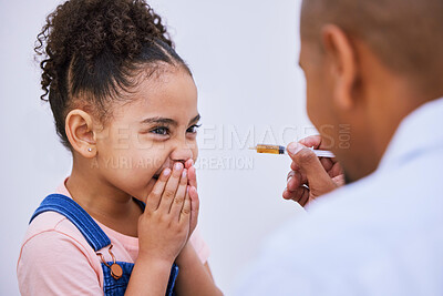 Buy stock photo Sick, syringe and funny with child and medicine for consulting, helping and illness. Medical, healthcare and cough syrup with young girl and parent in family home for wellness, care and supplements