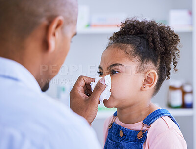 Buy stock photo Blowing nose, child and doctor with sick, disease and virus in a hospital or clinic. Paediatrician, young girl and tissue for allergies or flu with toilet paper for medical healthcare and support