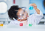 Science, learning and happy with child in laboratory for experiment, education and research. Future, study and knowledge with face of young girl and chemicals for results, medicine and analysis