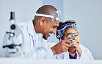 Lab study, father and child with magnifying glass for plant learning, research and science. Scientist, student and chemistry project with a happy dad and young girl with medical education analysis