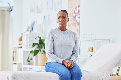Black woman, sick and patient waiting on hospital bed for doctor in checkup, appointment or consultation. African female person with flu, fever or mental health in illness for advice at the clinic