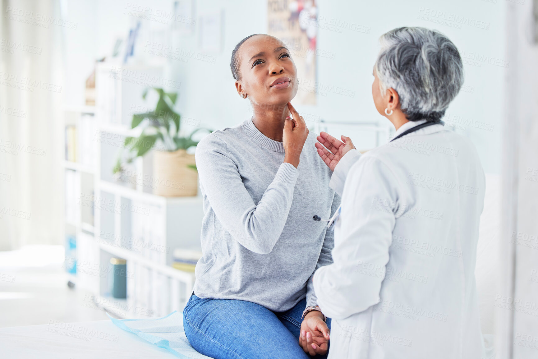 Buy stock photo Doctor, patient and hospital for sore throat of woman with virus, pain or infection. Health care worker and sick African person to check neck for thyroid, tonsils or respiratory medical consultation