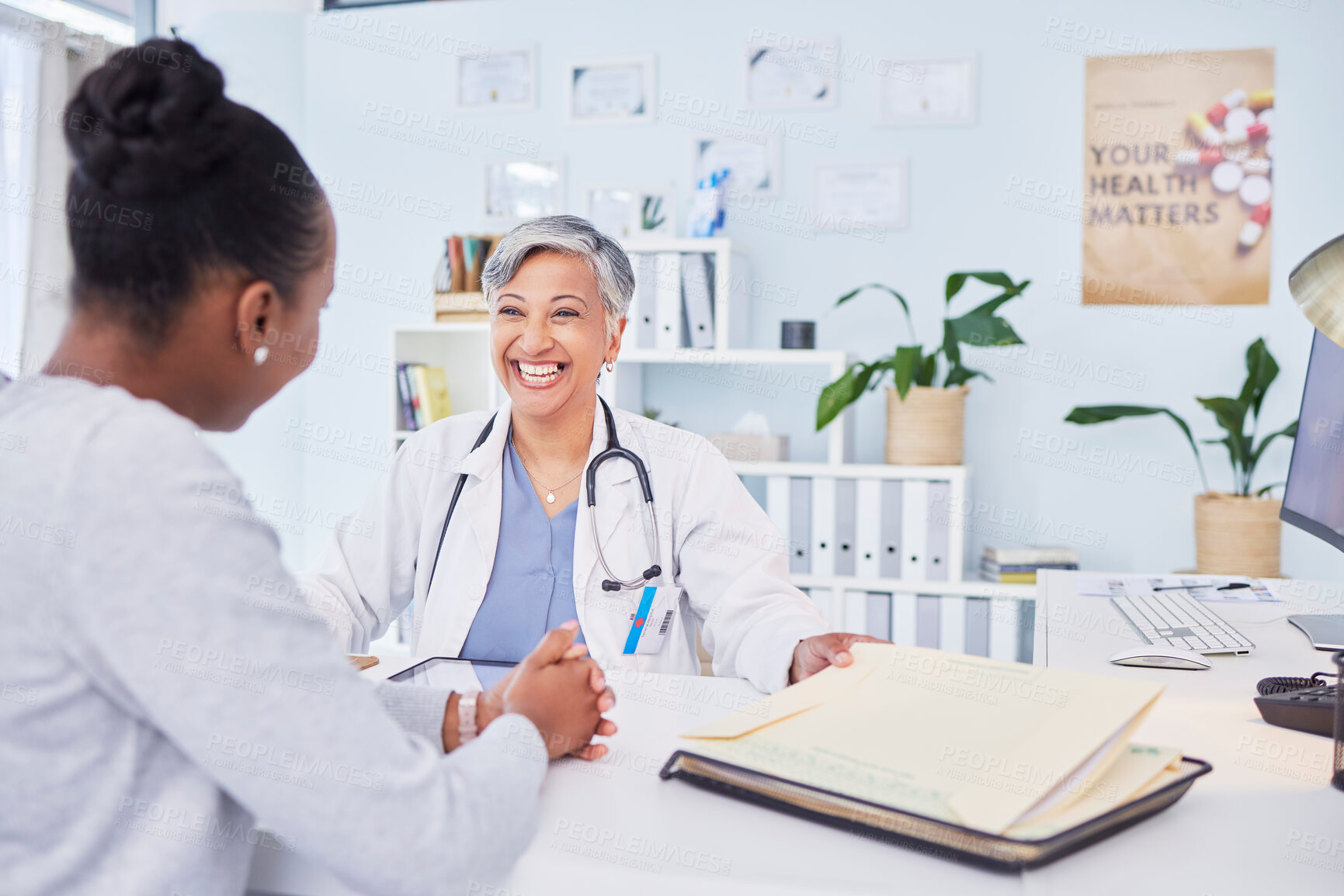 Buy stock photo Doctor, patient and talking at happy consultation in hospital with a woman for medical advice. Healthcare worker and person for conversation, results and communication about wellness and health