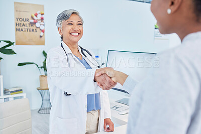 Buy stock photo Happy doctor, handshake and meeting patient in healthcare, visit or appointment at the hospital. Mature female person or medical professional shaking hands with customer in greeting or consultation