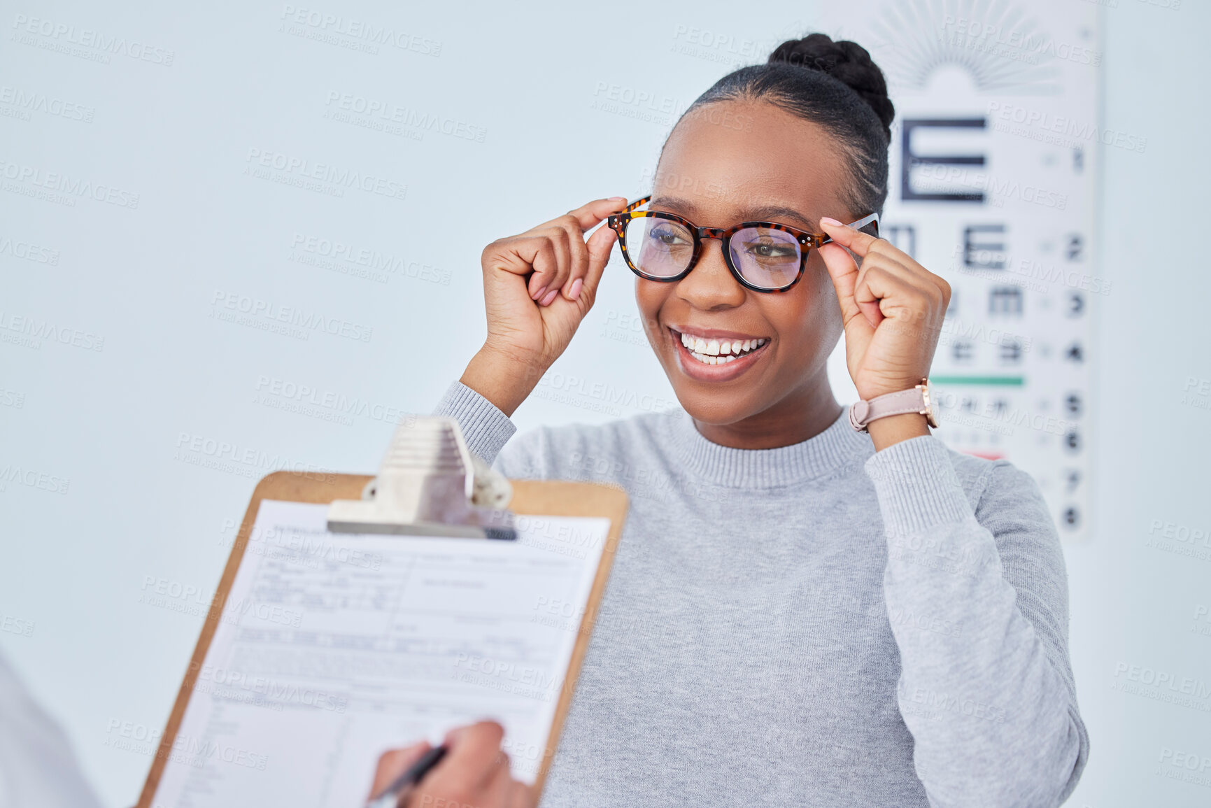 Buy stock photo Black woman, glasses and vision, clipboard and optometrist with health insurance, prescription lens and frame. People at clinic, optometry and writing, checklist and info with eye care and documents