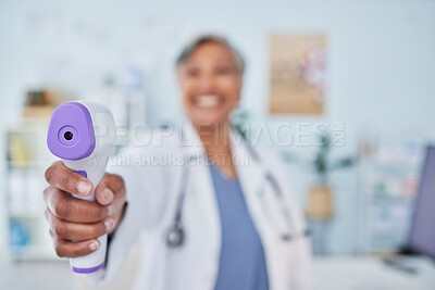 Buy stock photo Happy woman, doctor and infrared thermometer in checking temperature or fever at hospital. Closeup of female person, medical or healthcare professional with laser scanner for flu screening at clinic