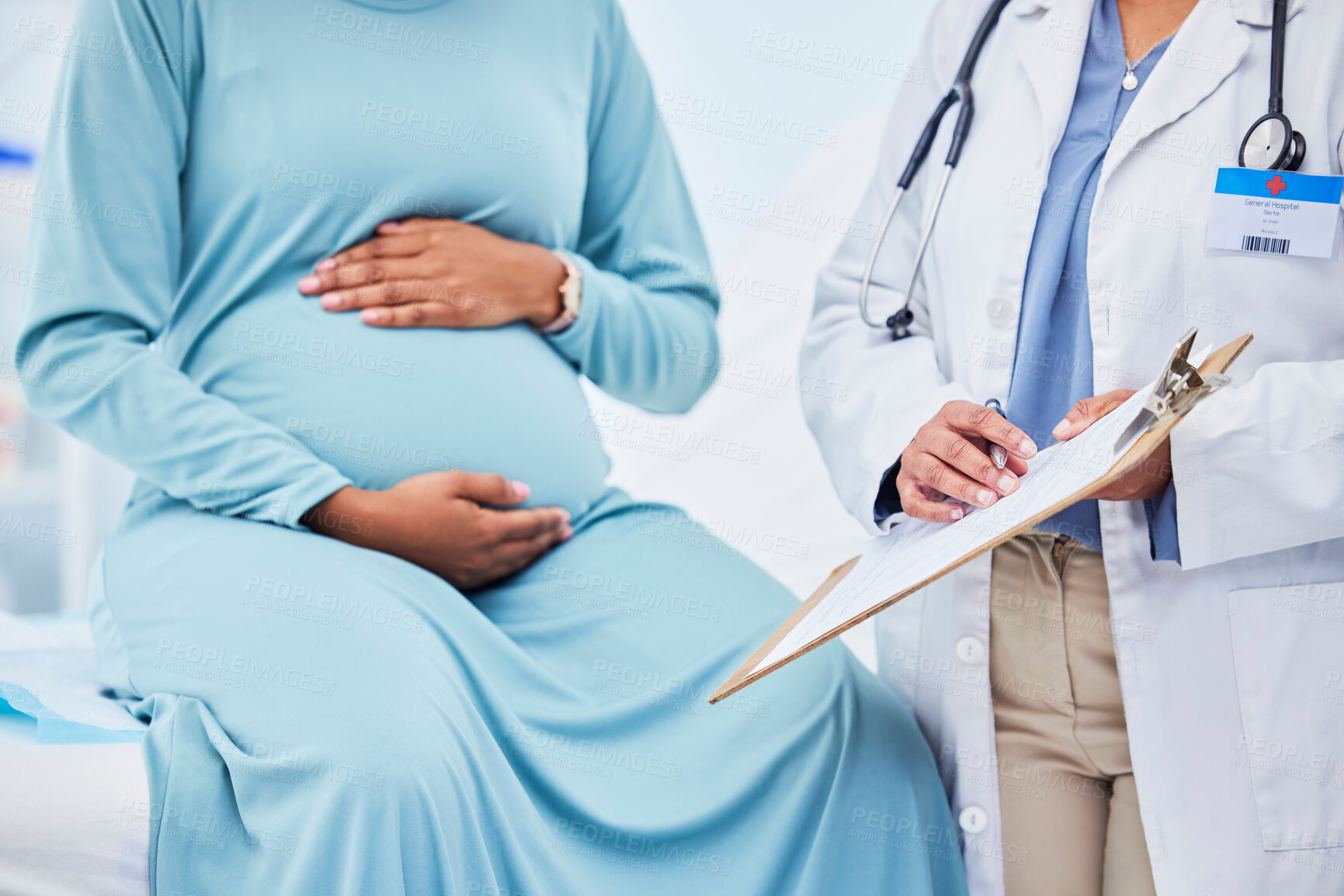 Buy stock photo Doctor, woman hands and pregnancy in a hospital with mama, stomach and baby care. Wellness, abdomen and pregnant healthcare with nurse and medical chart of a clinic check for health of a mother