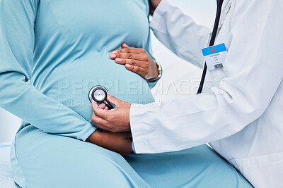 Buy stock photo Pregnant woman, doctor hands and stethoscope in hospital consulting, gynecology services or listening for baby. Mother stomach, abdomen and pregnancy, medical gynecologist or people in clinic support